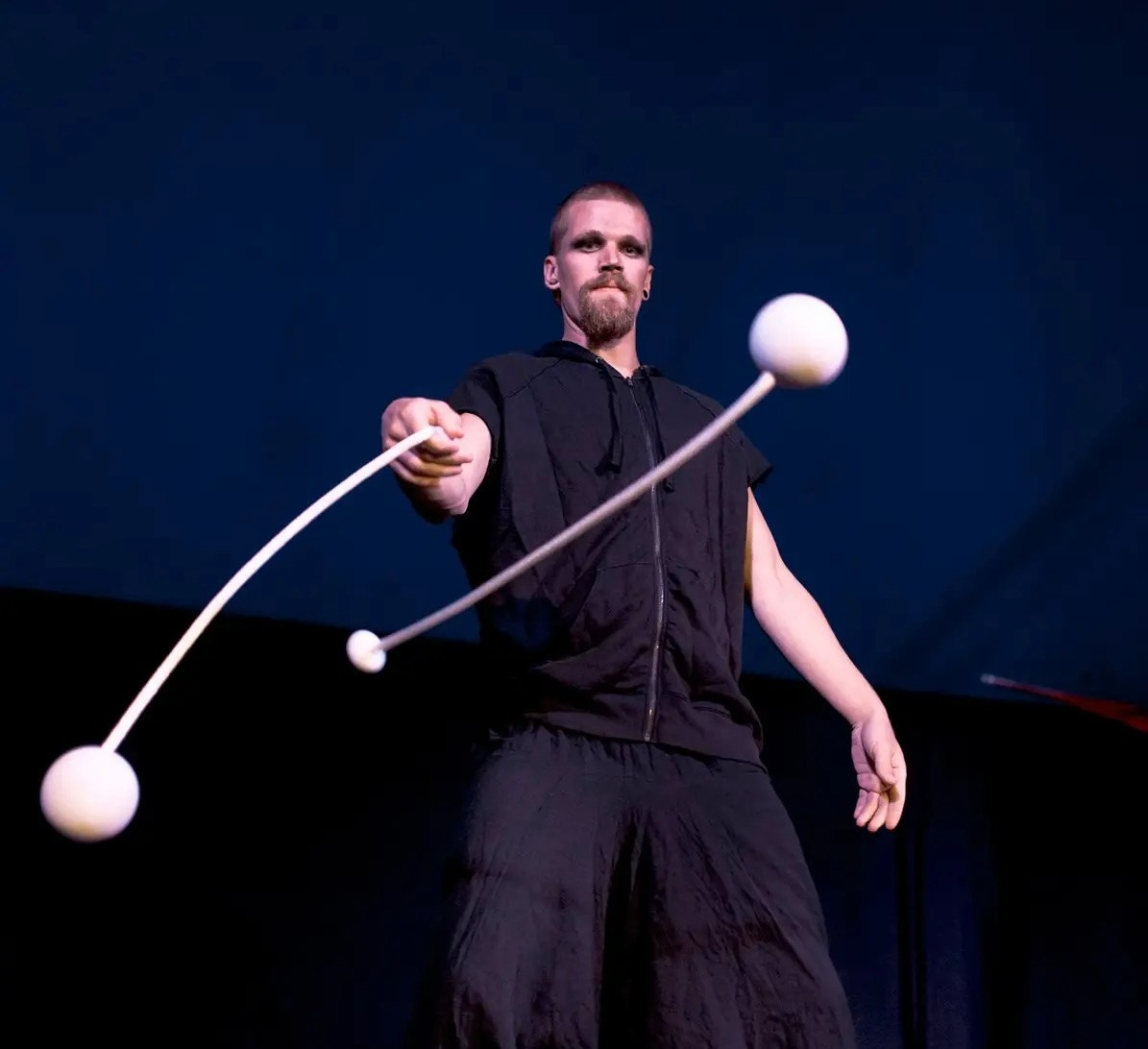 Morten performing with poi